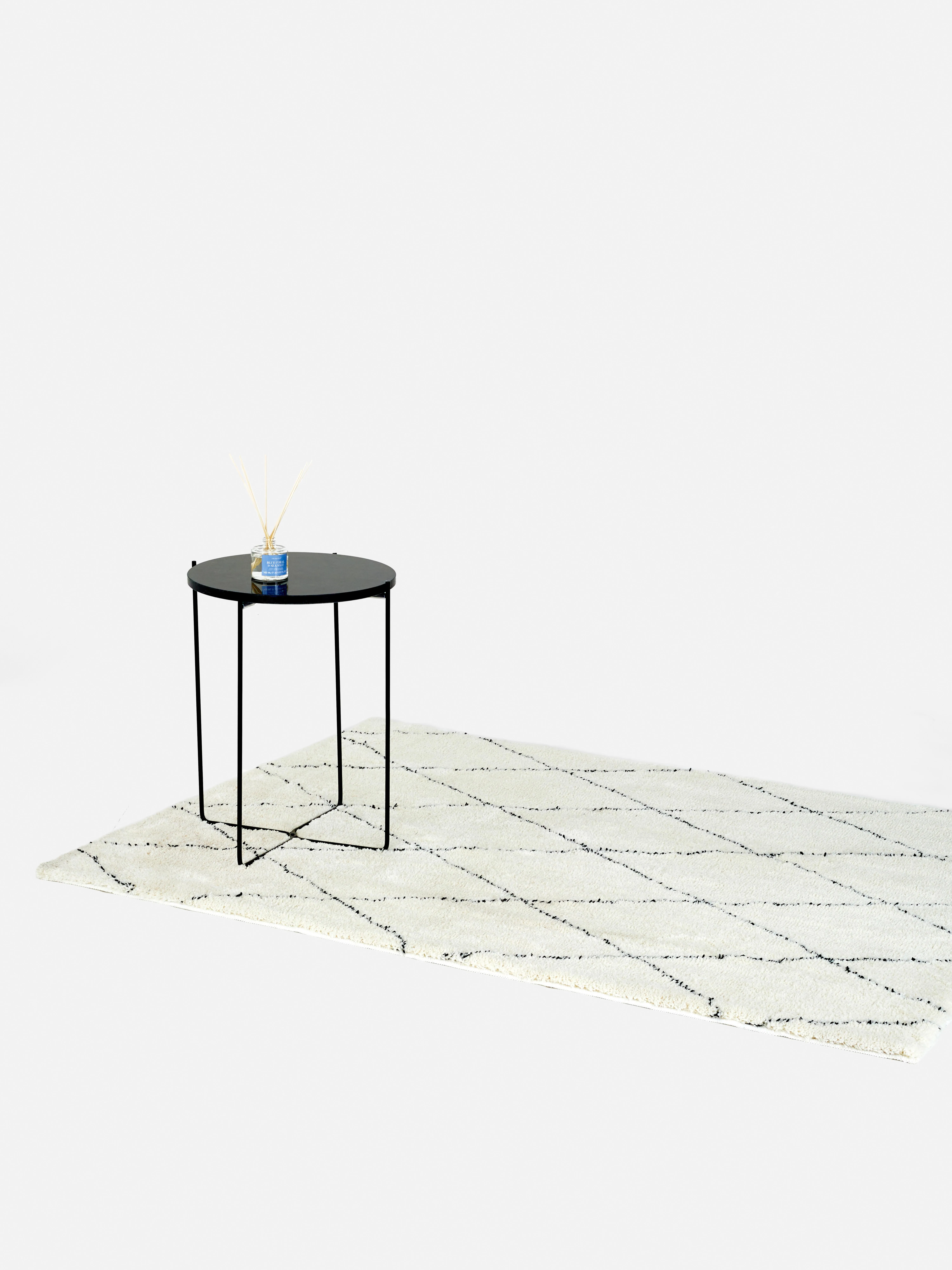 Alfombra con estampado de rombos