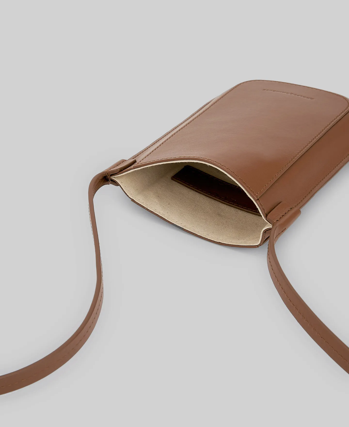 Brown leather mobile phone holder woman