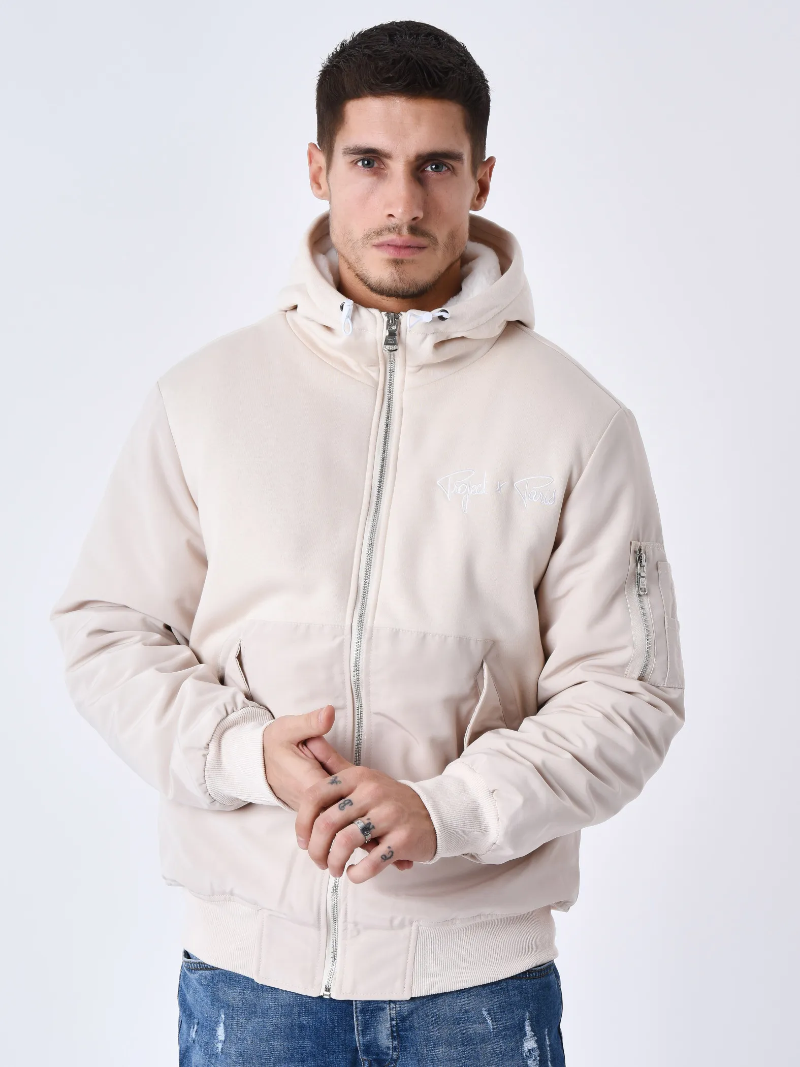Chaqueta bimaterial con capucha y forro polar