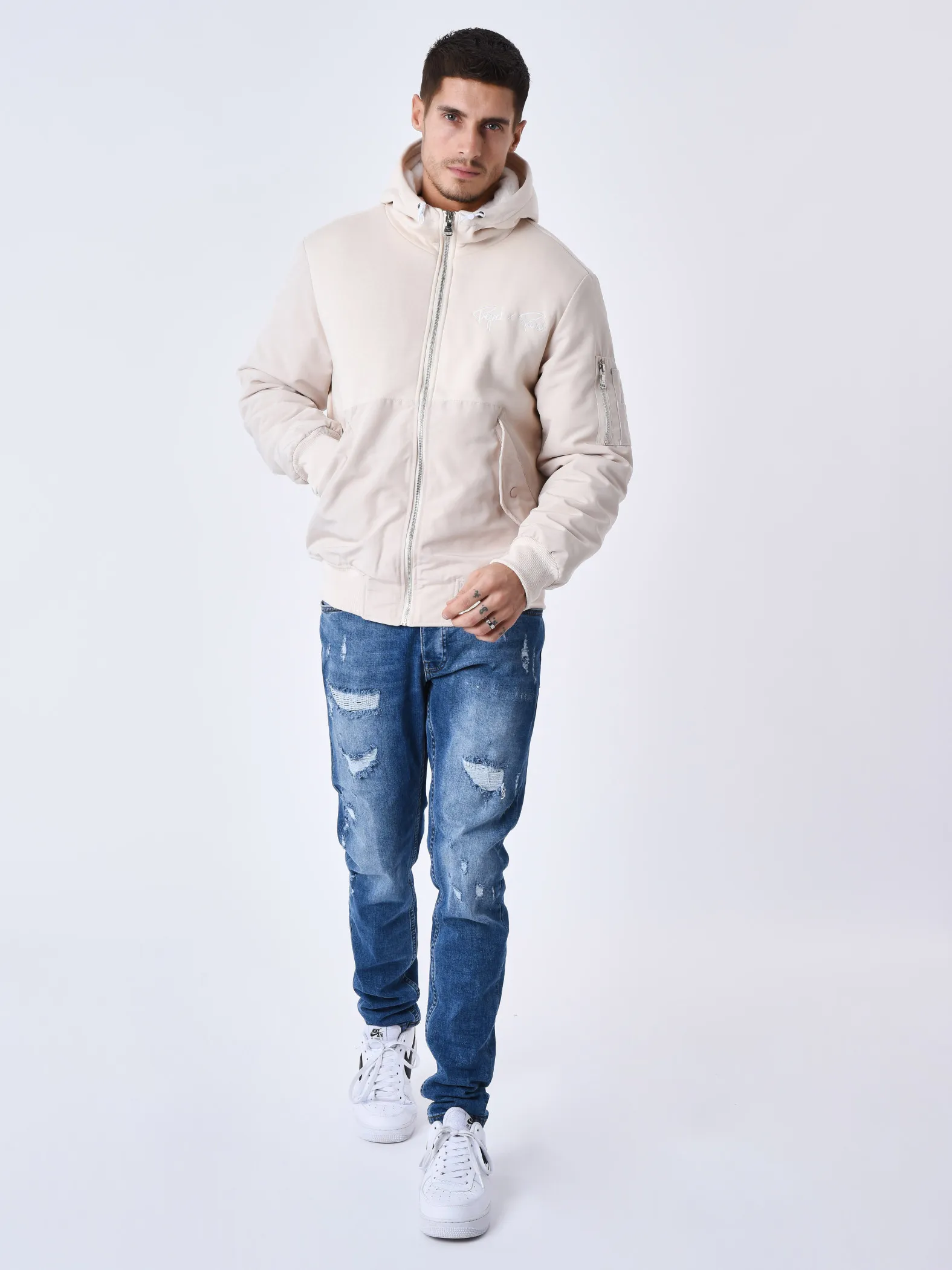 Chaqueta bimaterial con capucha y forro polar