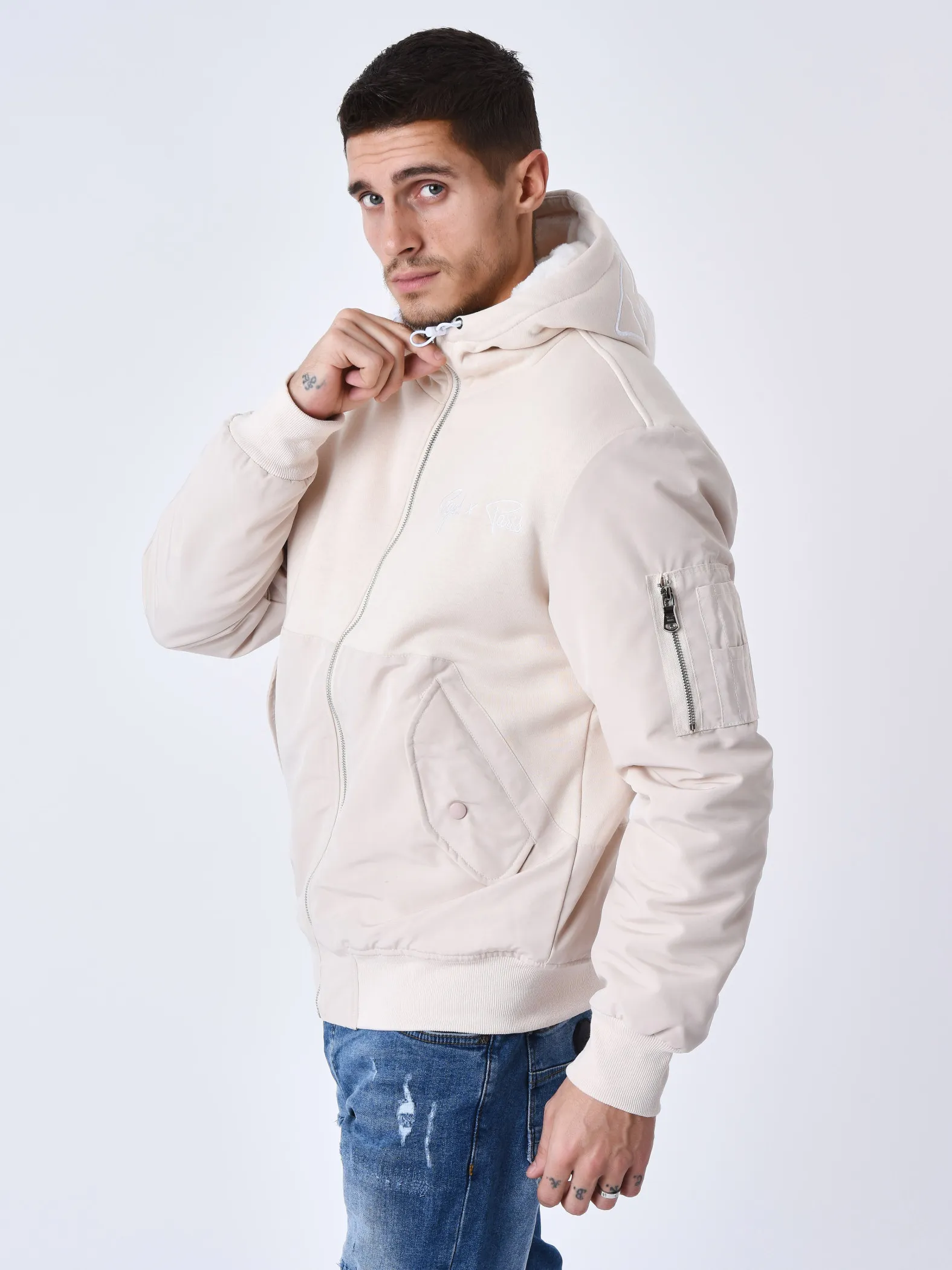 Chaqueta bimaterial con capucha y forro polar