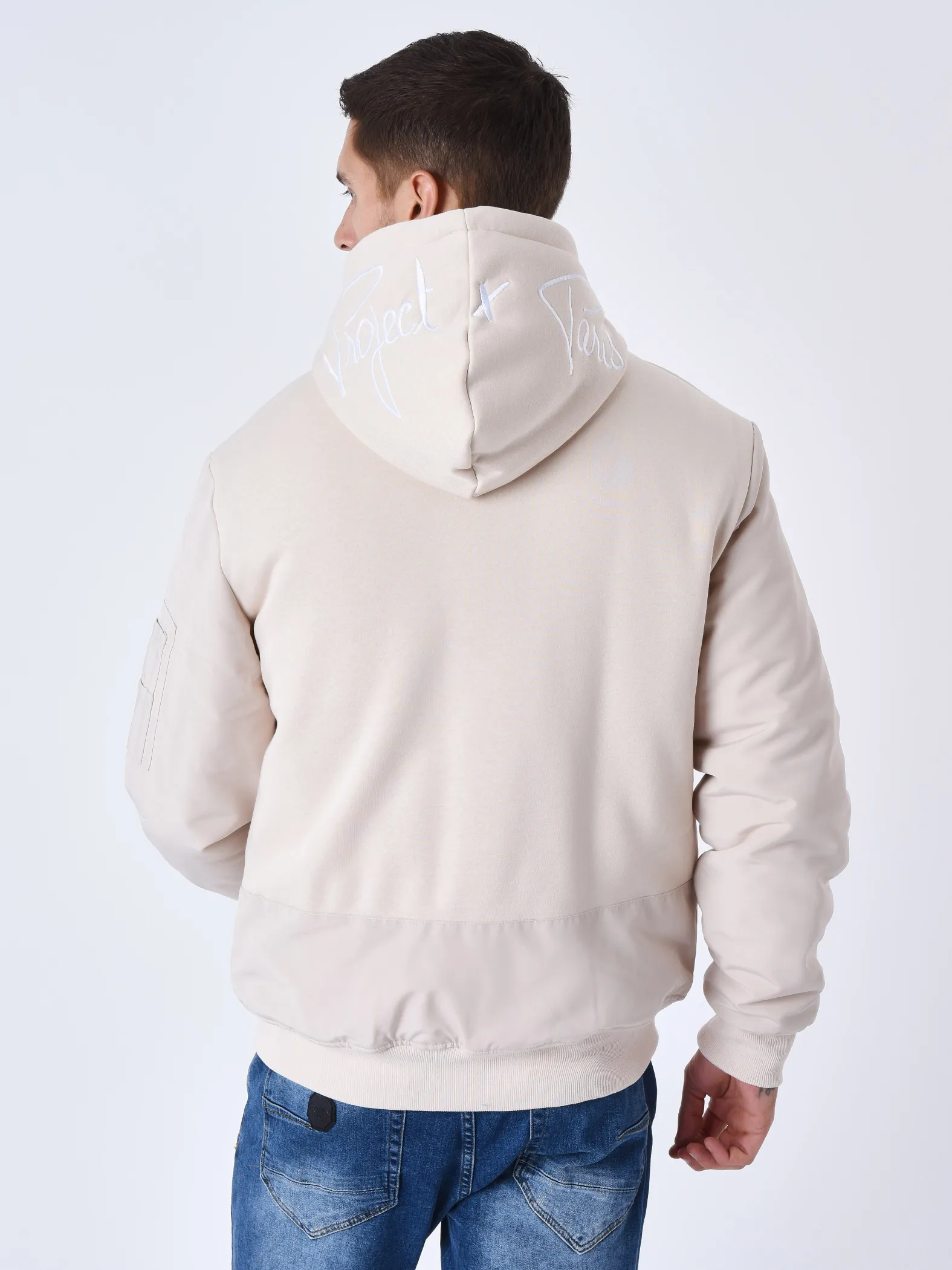 Chaqueta bimaterial con capucha y forro polar