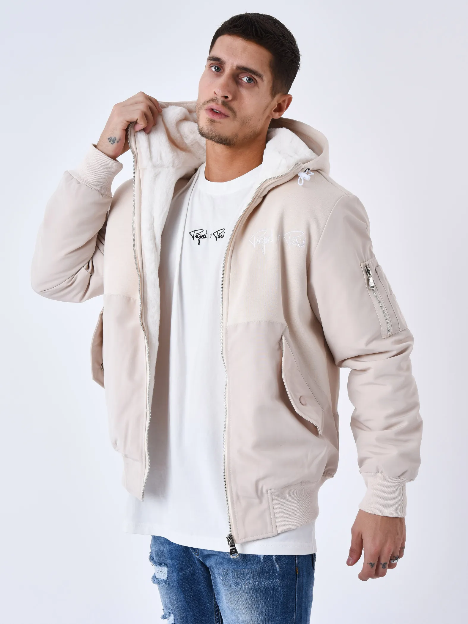 Chaqueta bimaterial con capucha y forro polar