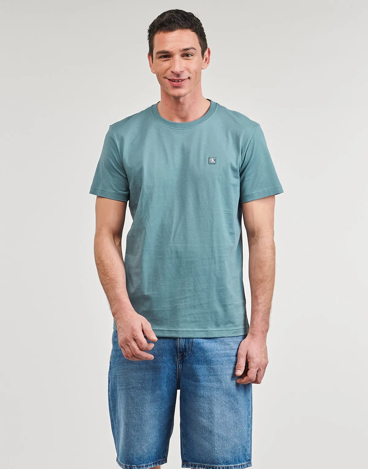 CK EMBRO BADGE TEE