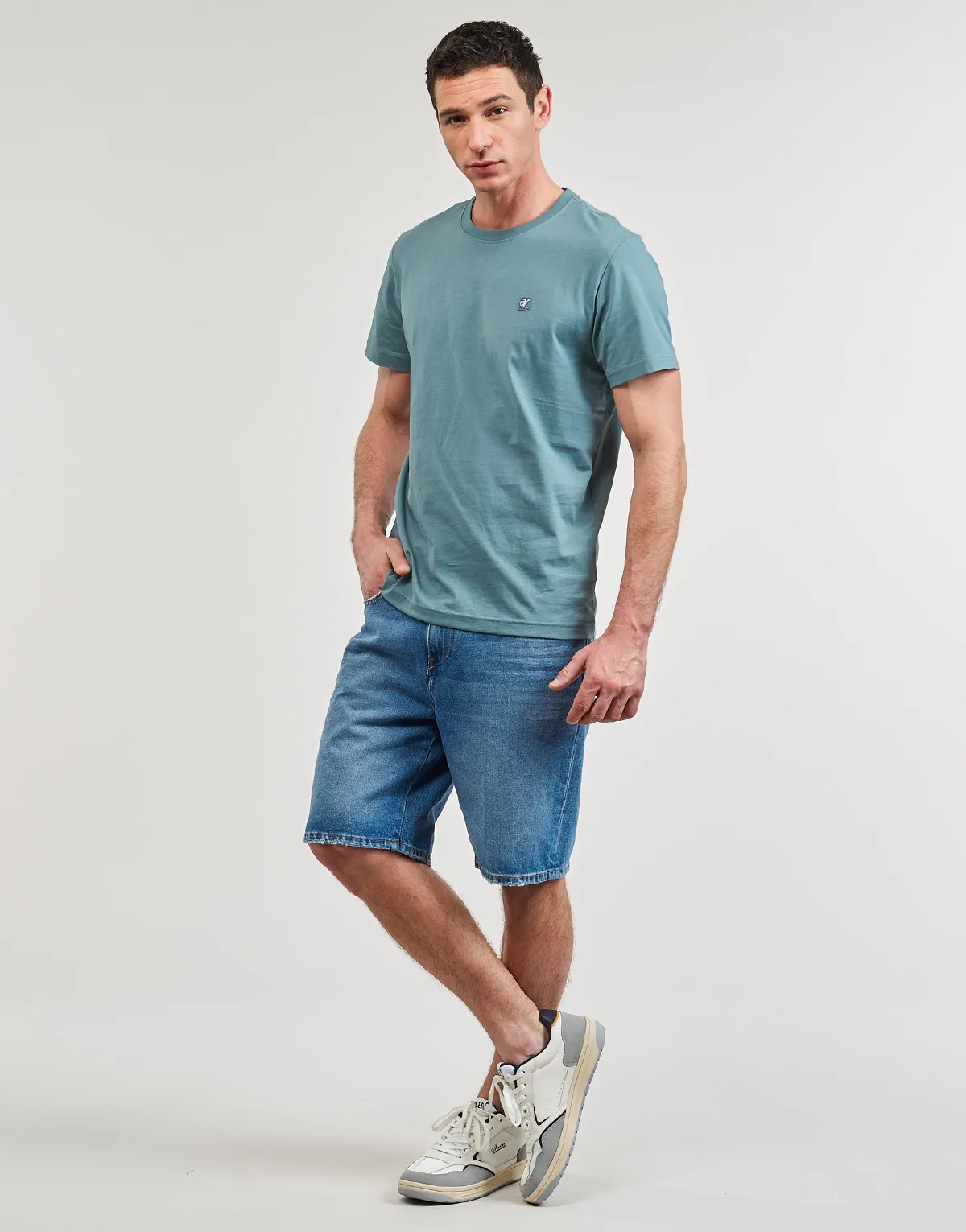 CK EMBRO BADGE TEE