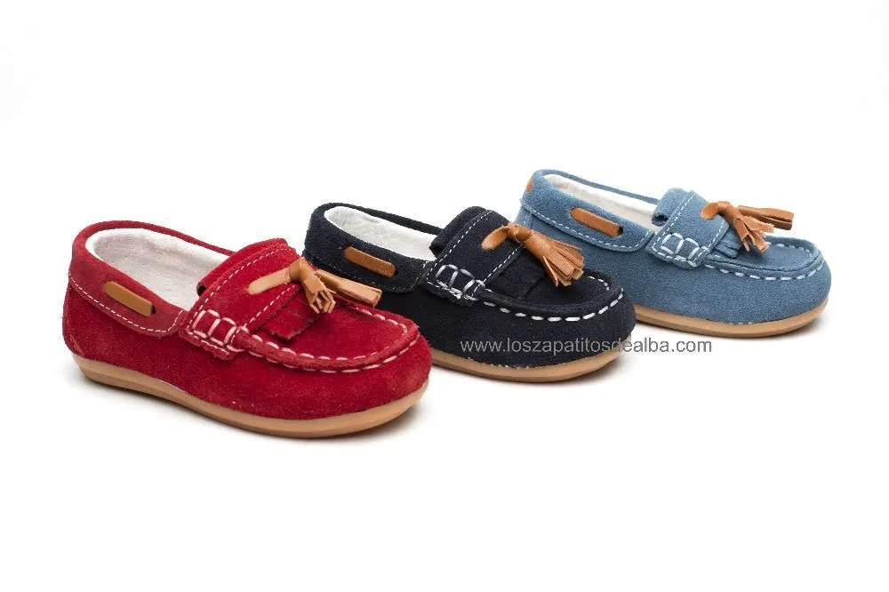 Mocasines Niño celeste modelo flecos