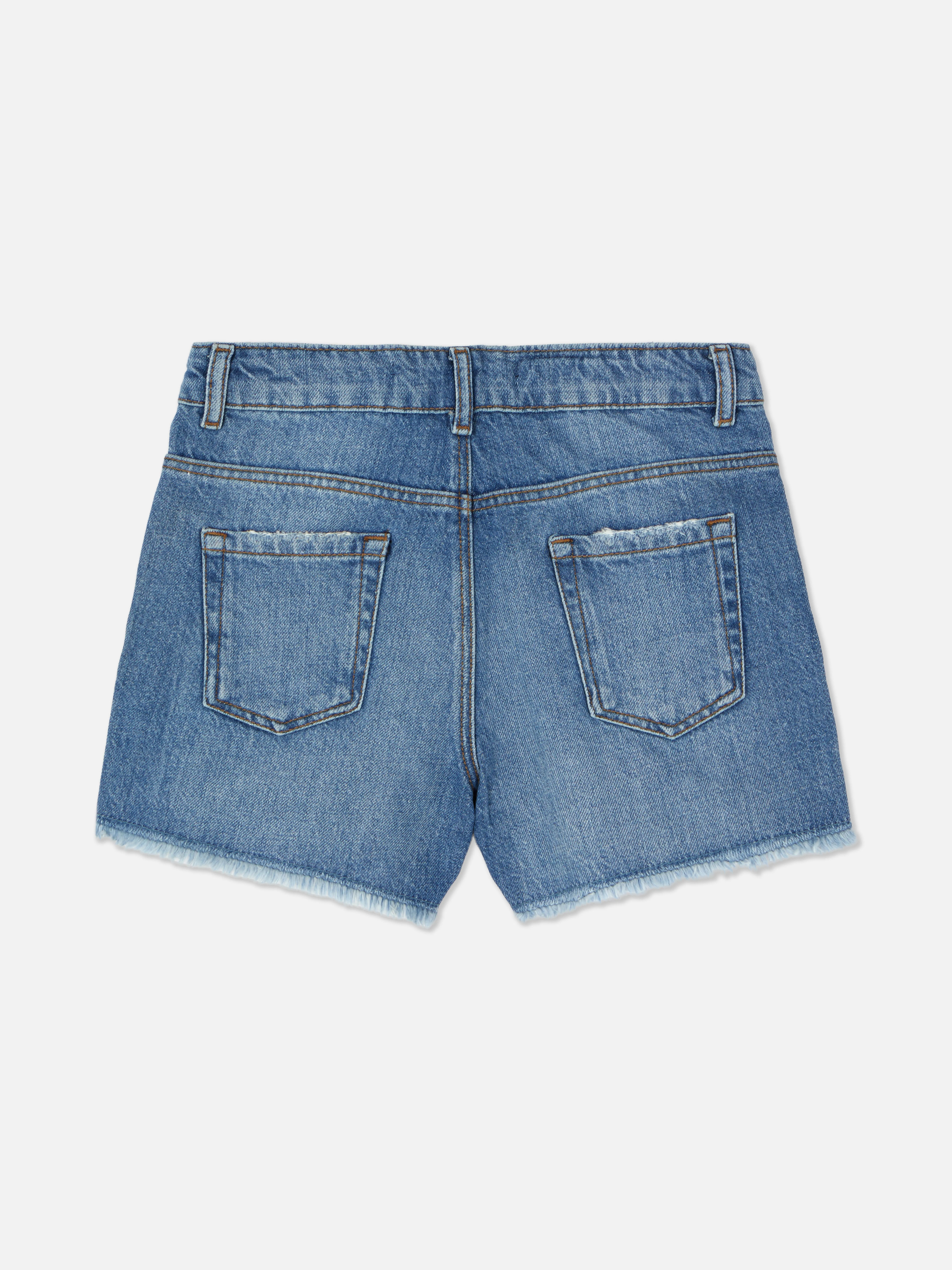 Pantalones cortos vaqueros con tachuelas y strass