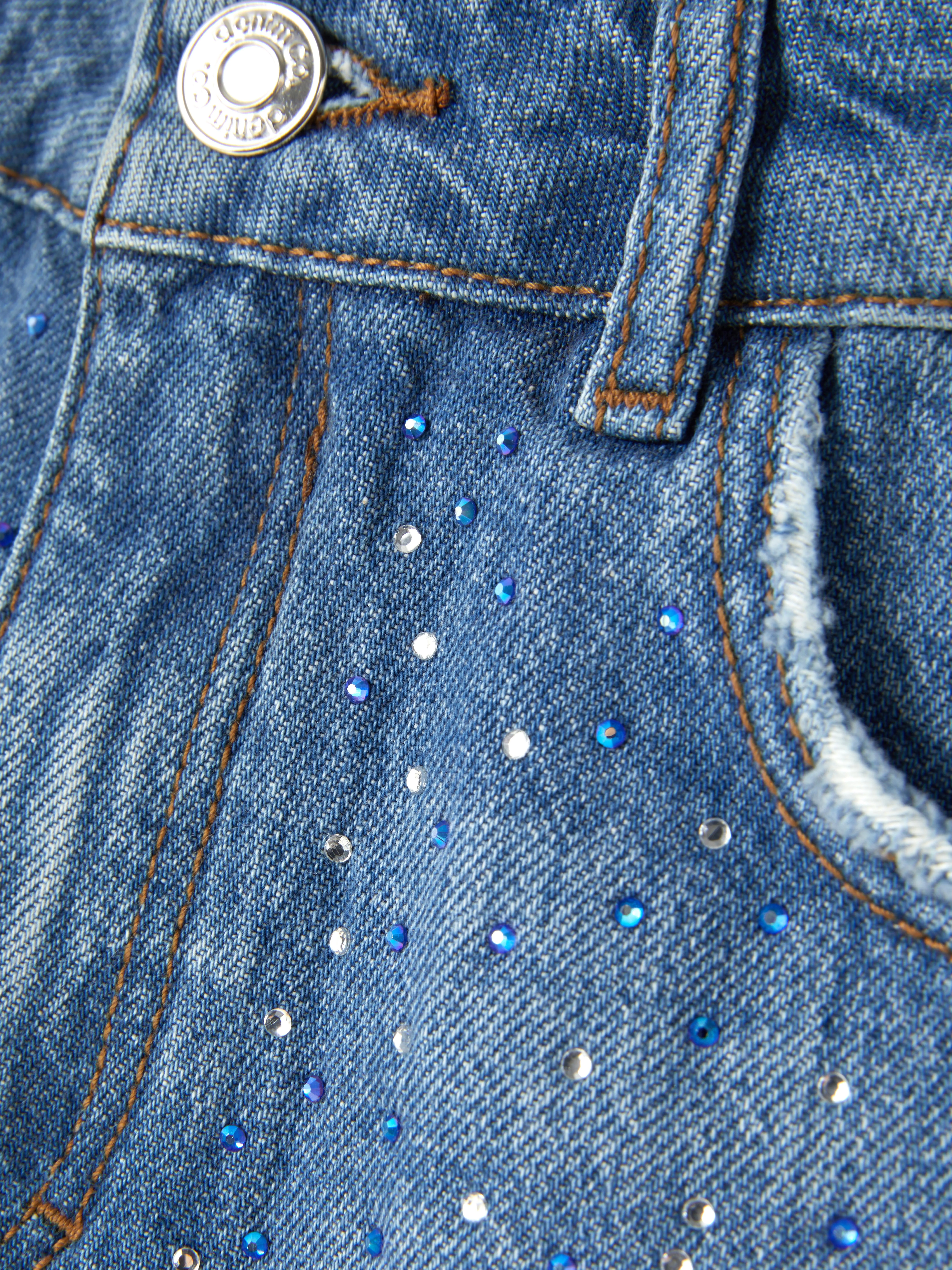 Pantalones cortos vaqueros con tachuelas y strass