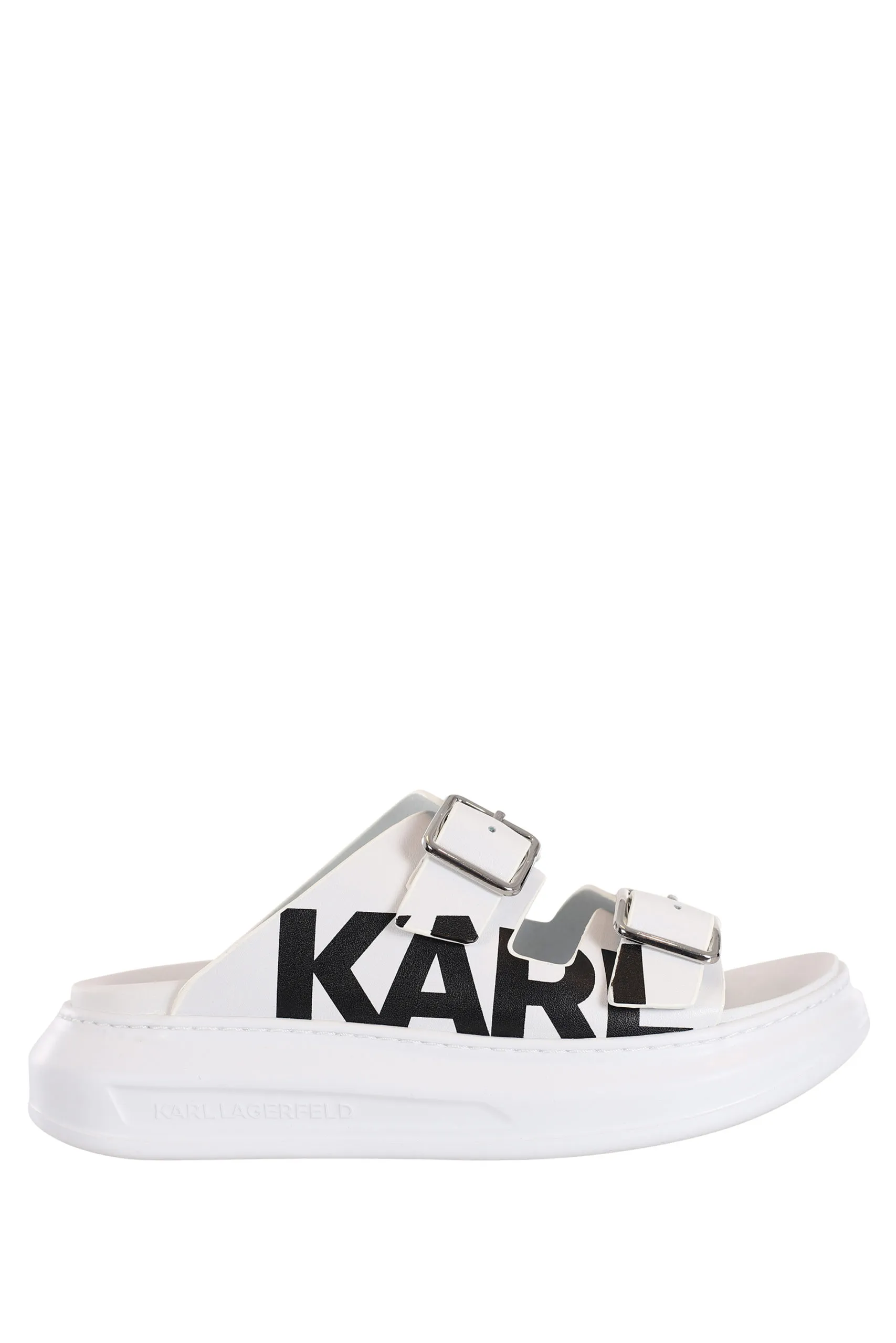 Sandalias blancas con hebillas y logo negro en el lateral
