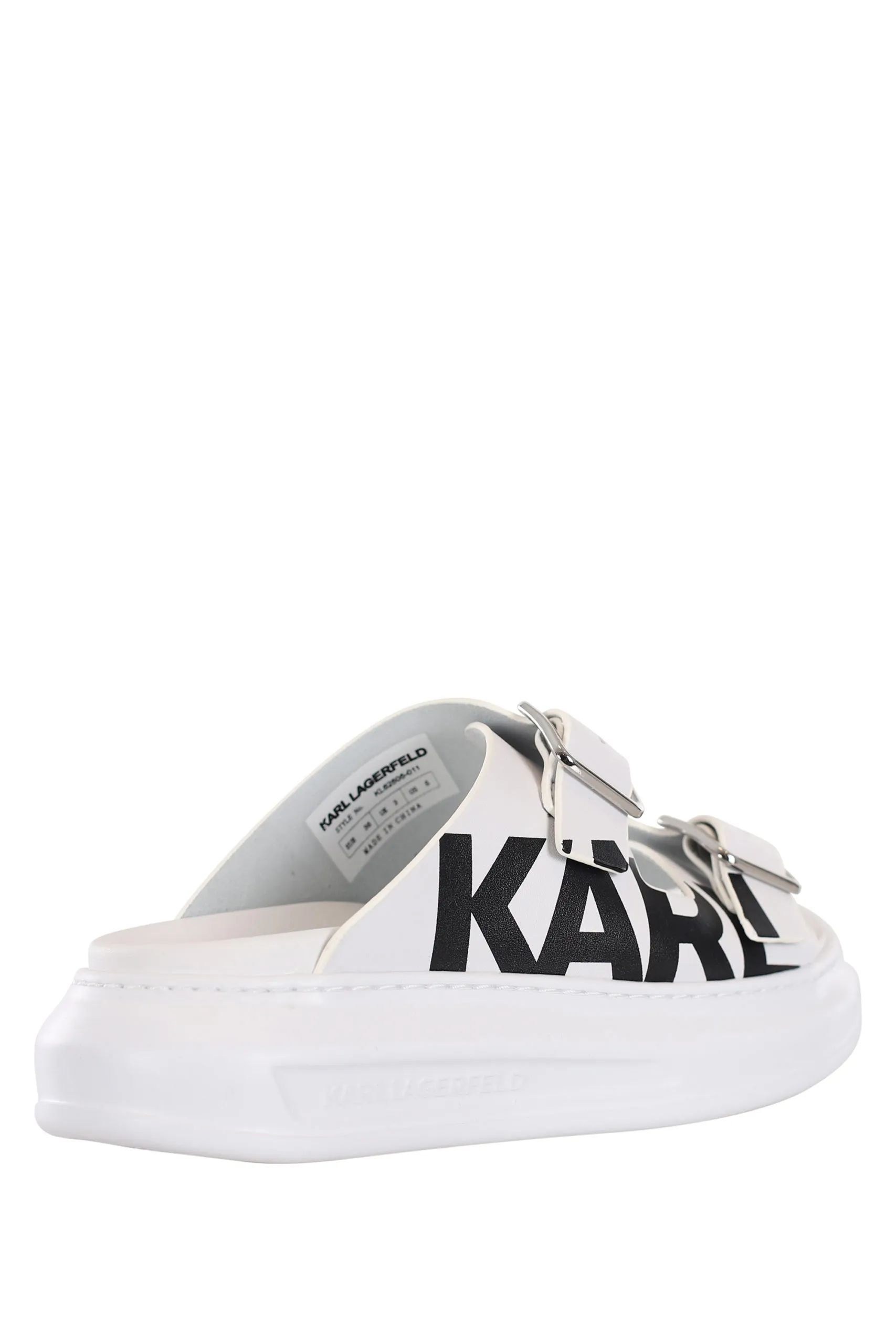Sandalias blancas con hebillas y logo negro en el lateral
