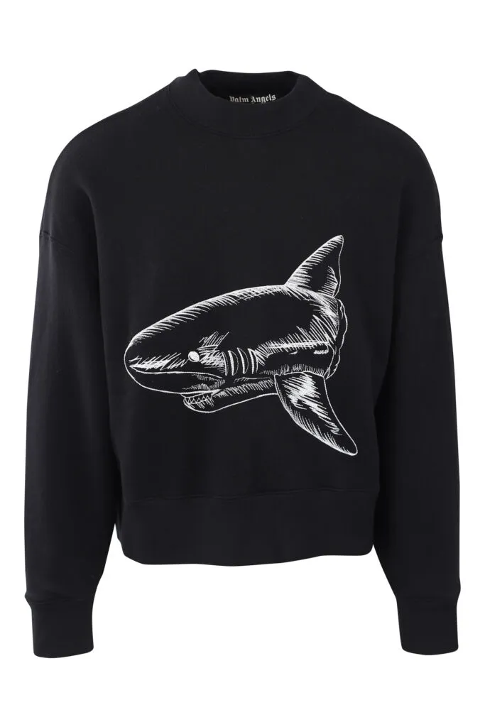 Sudadera negra con tiburón bordado blanco y logo detrás